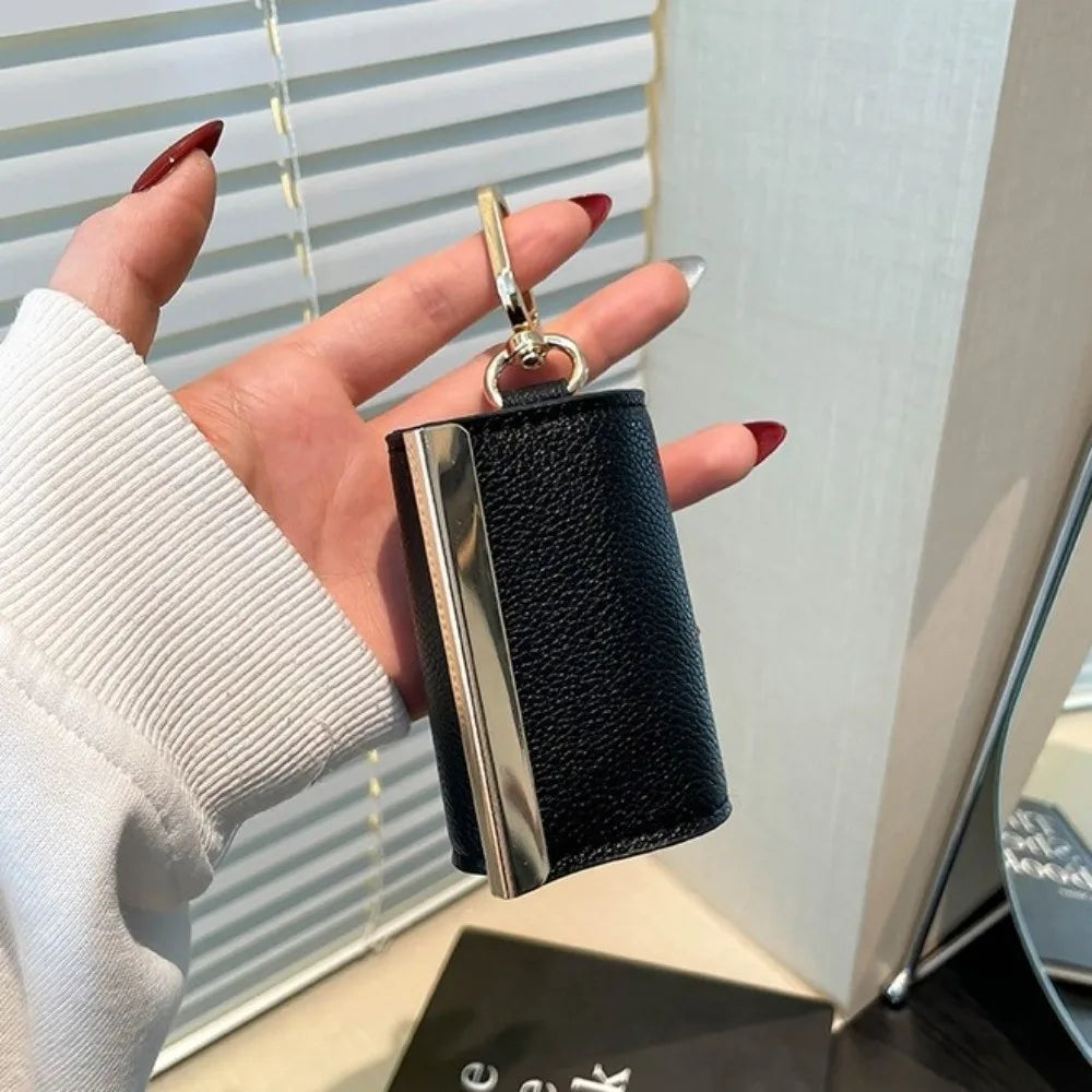 CarryCharm™-The bag that lives on your keys